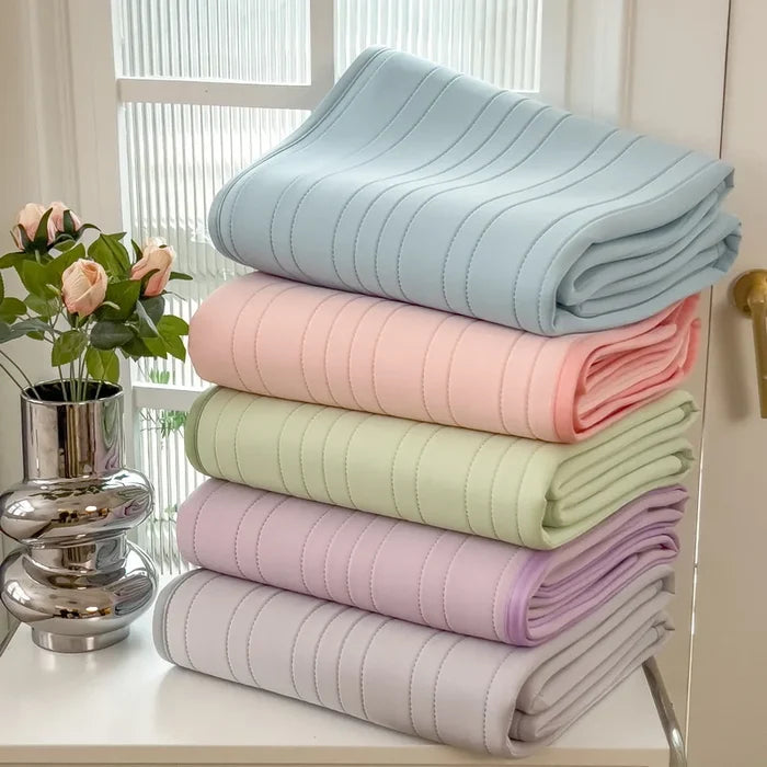 Cooling Ice Silk Mattress Pad by ShopHub NZ, designed for summer nights, featuring a soft, breathable fabric for ultimate comfort.