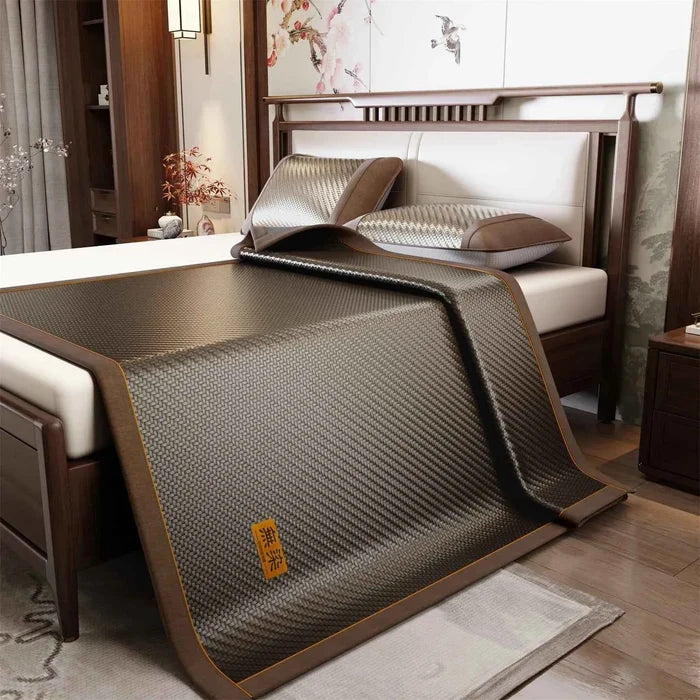Cooling mattress pad by ShopHub NZ shown on a bed, designed for comfortable, cool sleep during hot summer nights.