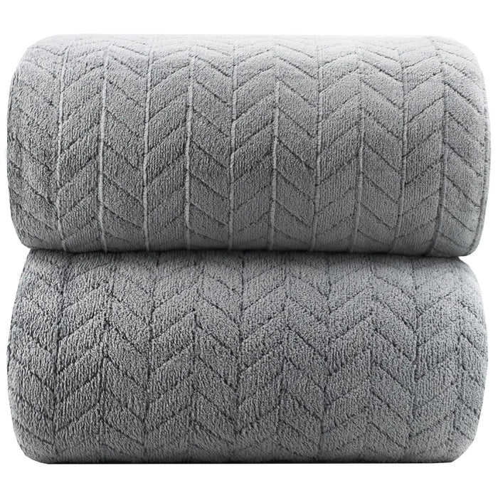 Extra large bath towel from ShopHub NZ, 27x55 inches, soft and absorbent, shown draped on a towel rack.
