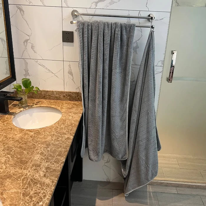 Extra large ShopHub NZ bath towel measuring 27x55 inches, soft and absorbent for luxurious bathroom use.