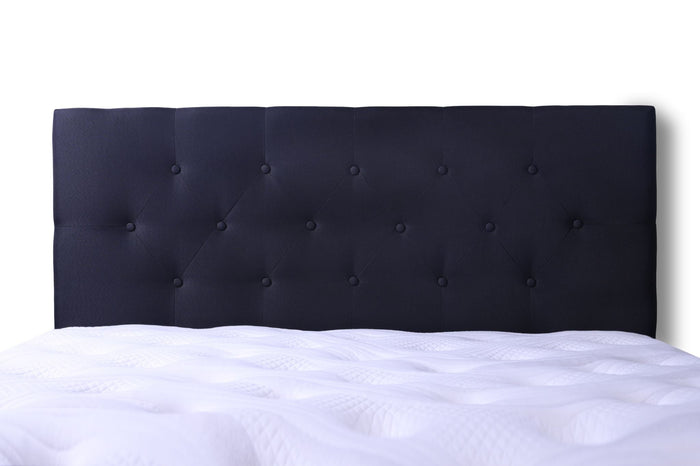 Black double Fenland headboard by sue-e furniture shown in a stylish bedroom setting with a modern design.