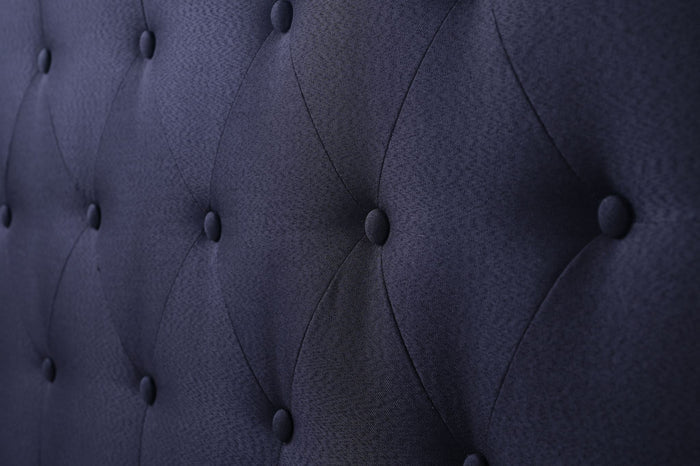 Black double Fenland headboard by sue-e furniture, showcasing a sleek, modern design with a smooth finish and headboard details.