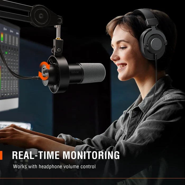 FIFINE Dynamic USB Microphone on a desk with adjustable stand, ideal for recording and streaming audio.