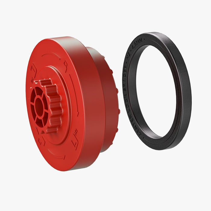 The HALOBLK Store H2-Centerlock Cap-Left includes a red plastic circular gear with grooves and notches, plus a separate black ring featuring engraved text, both displayed on a plain white background.