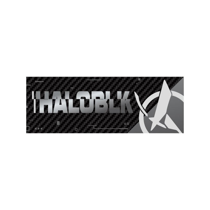 The HALOBLK Carbon Fiber Emblem – HALO EFFECT Series from HALOBLK Store features a rectangular logo with bold, metallic "HALOBLK" text on black carbon fiber, plus a stylized rocket and circular accent on the right side.