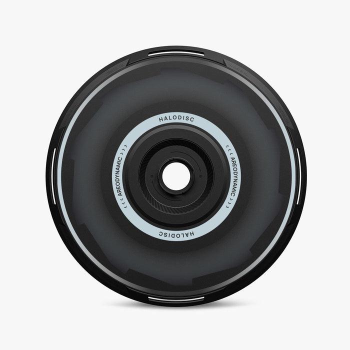 A sleek, modern HALODISC 2 Replacement Wheel Cover from HALOBLK Store for Tesla Model Y丨Vision-GT, black and circular with a central hub, labeled “HALODISC” and “AERODYNAMIC” around the inner ring.