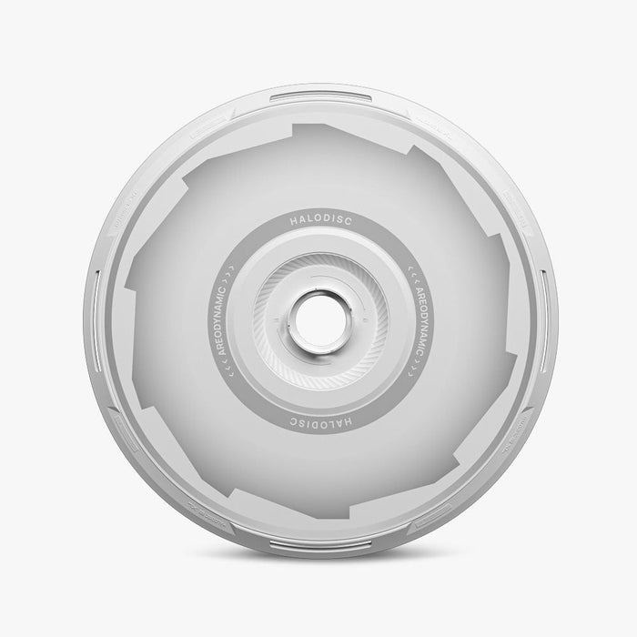 A top-down view of the HALODISC 2 Replacement Wheel Cover for Tesla Model Y by HALOBLK Store, featuring a silver, aerodynamic design with "HALODISC" and "AERODYNAMIC" printed around the central hub.