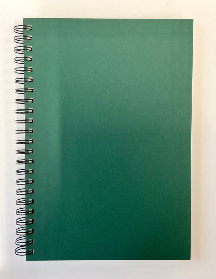 Green spiral-bound notebook on a white background