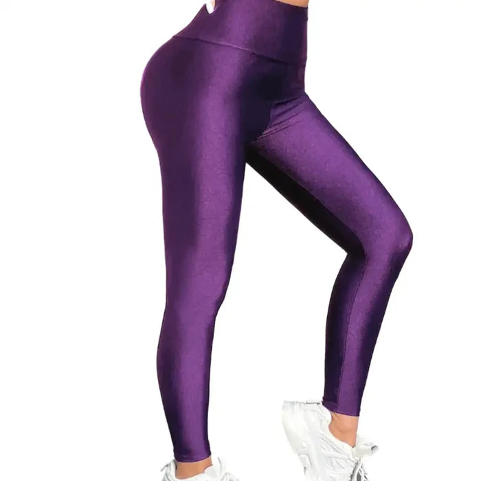 High-waisted purple gloss leggings for women by Habicare, featuring a shiny, form-fitting design for active wear or casual style.
