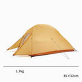Mead's Supply & Equipment Outfitters camping tent set up outdoors, featuring durable fabric and multiple windows for ventilation.