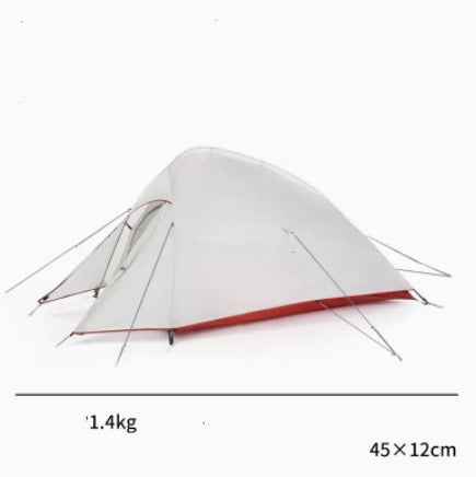 Mead's Supply & Equipment Outfitters hiking camping tent set up outdoors on grass with trees in the background.