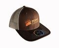 Brown trucker hat with mesh back, Kodiak Canvas logo and bear paw embroidery, perfect for outdoor enthusiasts.