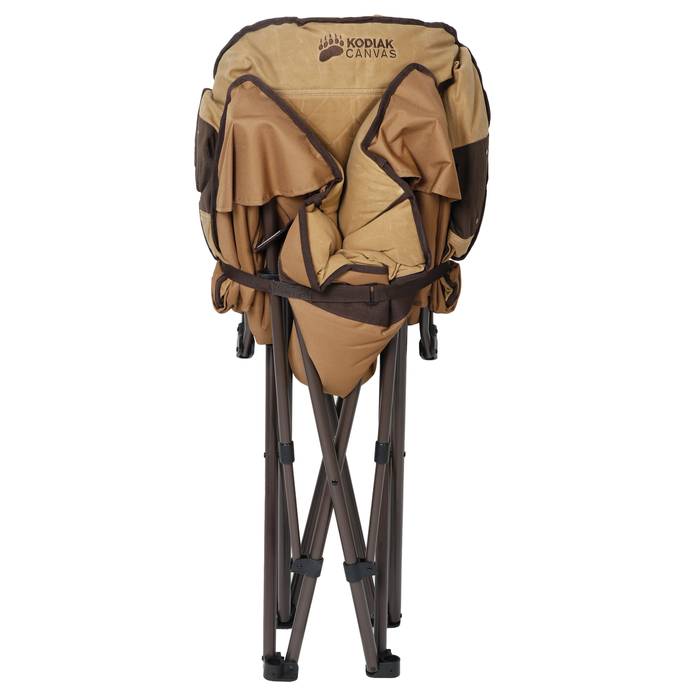 Kodiak Canvas folding chair in brown, sturdy fabric, ideal for camping and outdoor activities.