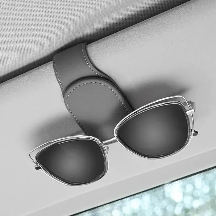 Leather HBC Habicare car sunglasses and card holder clip with secure attachment and sleek design for vehicle convenience.