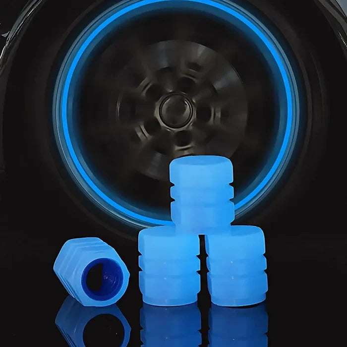 Luminous fluorescent HBC tire valve caps by Habicare, glowing in the dark, designed for car or bike tire valve stems.