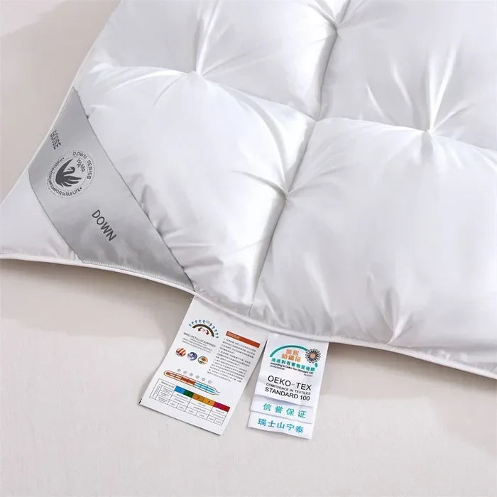 White goose down quilt by ShopHub NZ, showcasing a plush, soft quilt with a cozy, luxurious appearance for comfort and warmth.