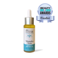 Bottle of Manuka Glow face oil by The Honey Collection, 30ml, with natural ingredients in a clear glass bottle.