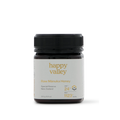 Jar of Happy Valley Honey Mānuka Honey UMF® 24+ with golden color and label, showcasing high-quality Manuka honey in a glass jar