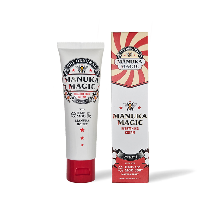 Manuka Magic remedial cream from The Honey Collection in a transparent jar with a golden lid, showcasing a smooth, natural cream texture.