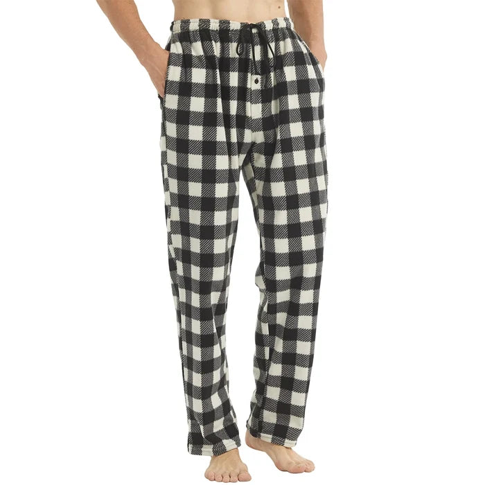 Men's fleece pajama pants from ShopHub NZ, soft and warm sleep bottoms with pockets, ideal for cozy nighttime comfort.