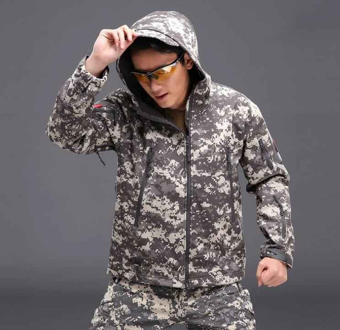 Men's tactical softshell jacket by Mead's Supply & Equipment Outfitters, waterproof, windproof, fleece-lined outdoor and hiking jacket.
