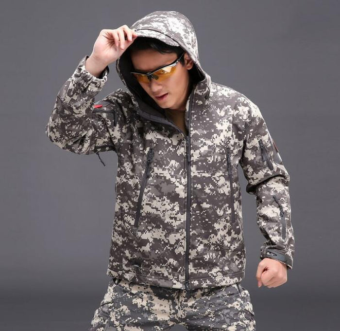 Men's tactical softshell jacket by Mead's Supply & Equipment Outfitters, waterproof, windproof, fleece-lined outdoor jacket for hiking.