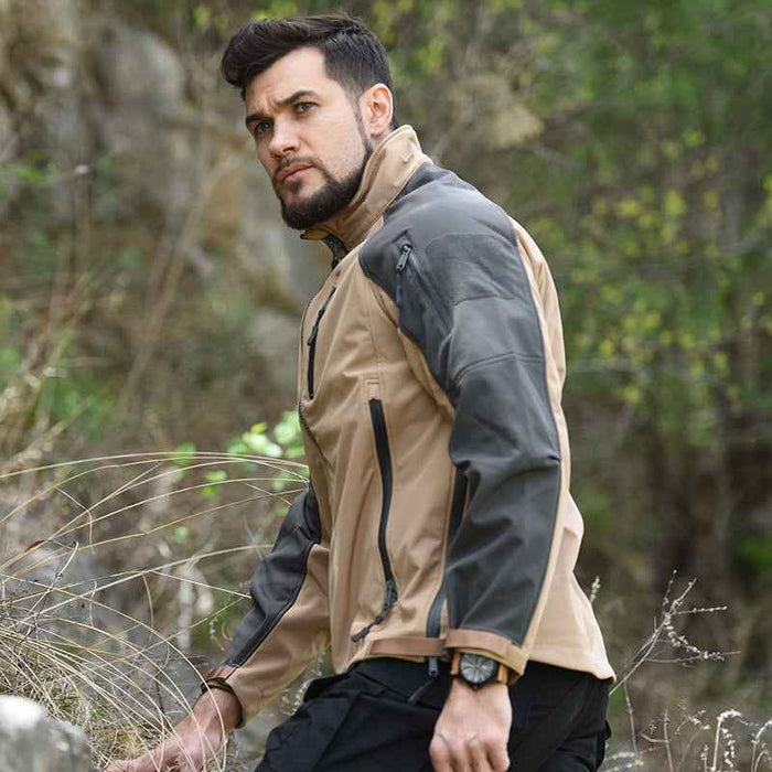 Men's waterproof tactical softshell jacket for fall and winter, featuring durable fabric and multiple pockets by Mead's Supply & Equipment Outfitters