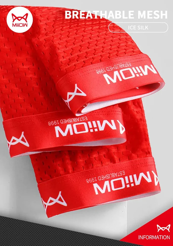 Set of three MiiOW Ice Silk men's boxer shorts featuring breathable, sexy mesh design for comfortable underwear.