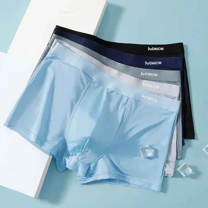 Three pairs of men's breathable boxer shorts by MiiOW, featuring comfortable fabric and relaxed fit for everyday wear.