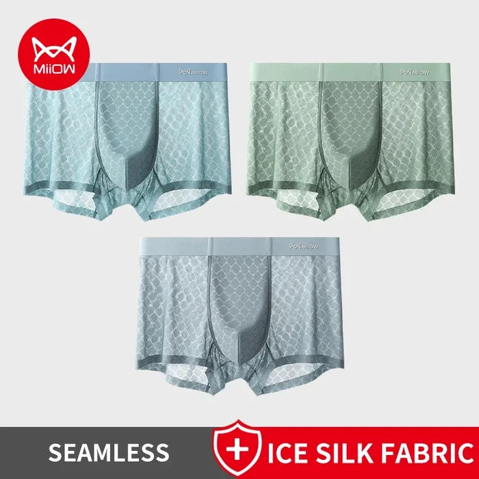 Set of three breathable men's boxer shorts by MiiOW, comfortable underwear for everyday wear, in neutral colors.