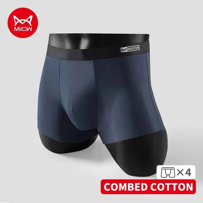 Four pairs of MiiOW cotton men's boxer shorts featuring breathable, antibacterial fabric for comfortable everyday wear.
