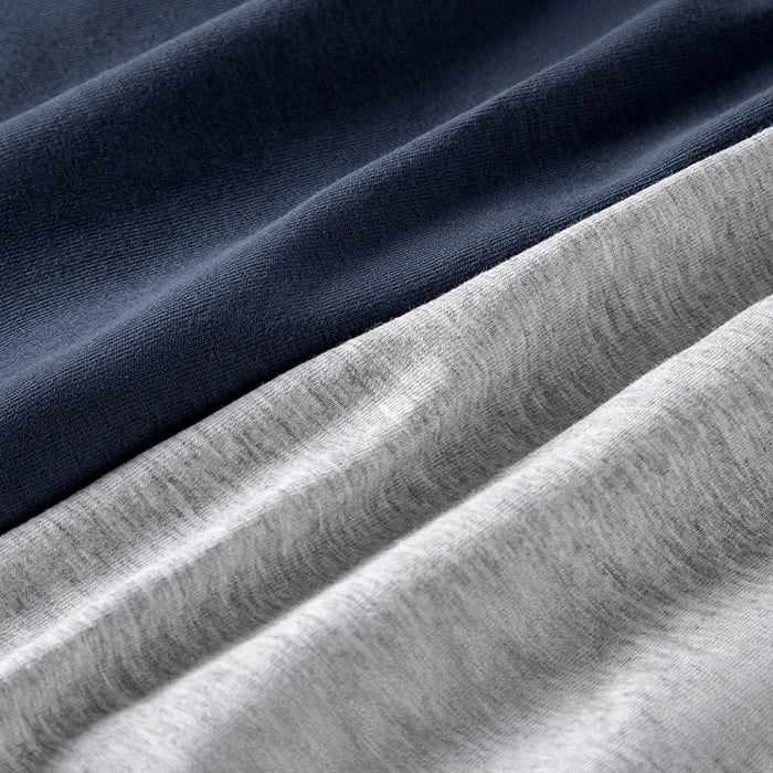 Set of four MiiOW men's cotton boxer shorts featuring breathable, antibacterial fabric for comfortable everyday wear.
