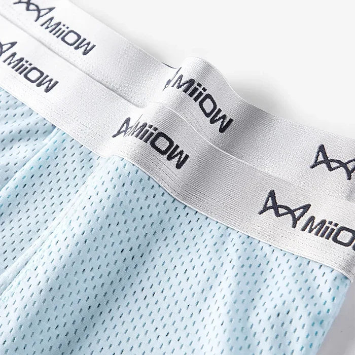 Three pairs of MiiOW Ice Silk men's boxer briefs in breathable mesh with antibacterial fabric, displayed in a pack.