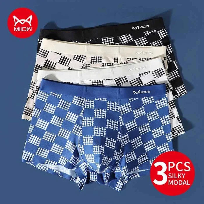 Three pairs of men's antibacterial boxer shorts by MiiOW in modal cotton, displayed in a pack on a neutral background.