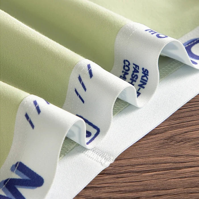 Three pairs of MiiOW cotton men's boxer shorts with antibacterial, soft, silky, breathable fabric in a 3-pack.