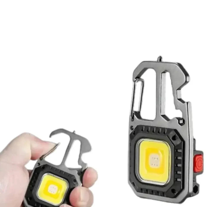 Habicare Mini LED Keychain Flashlight SS showing compact silver flashlight with keyring attachment on a white background.