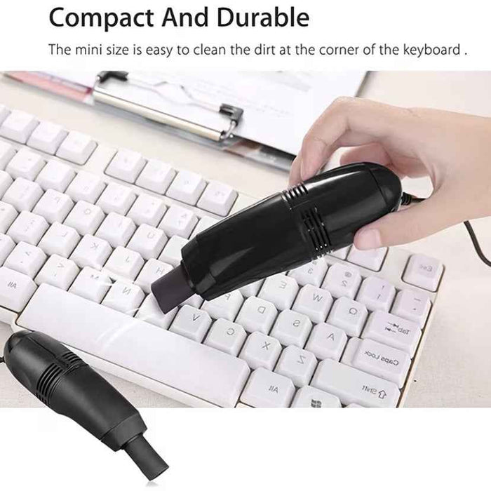 Mini USB Office Vacuum Cleaner by 9eight5, compact tool with a small nozzle for cleaning keyboards and desks.