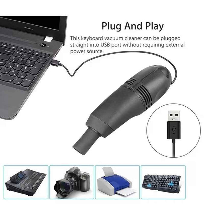 Mini USB office vacuum cleaner by 9eight5, compact handheld device with a nozzle for cleaning dust from keyboards and small surfaces.