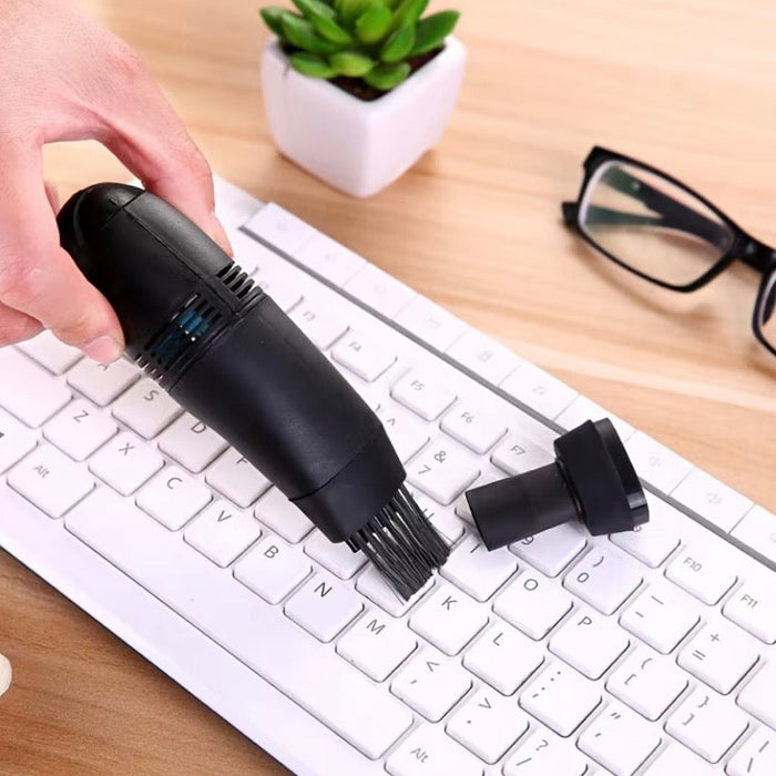 Mini USB office vacuum cleaner from 9eight5 with a compact design, ideal for cleaning keyboard and small workspace areas.