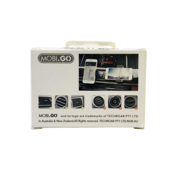 9eight5 Mobigo phone holder attached to a desk, versatile phone and tablet accessory with adjustable grip for secure placement.