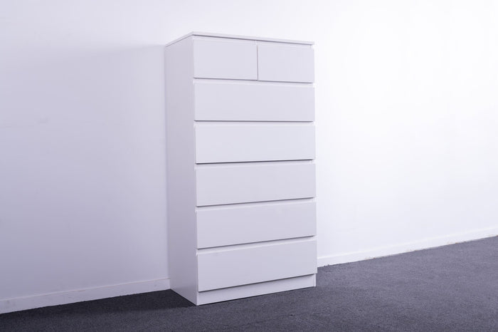 Tall boys chest of 7 drawers from Sue-E Furniture's Monaco collection, featuring a sleek wooden finish and modern design.