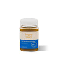 Jar of Happy Valley Honey bee venom supplement featuring a honeycomb label and golden honey inside.