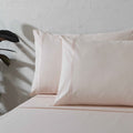 Organic cotton peach mist sheet set from Whites of London NZ, 250 thread count, includes fitted and flat sheets with pillowcases.
