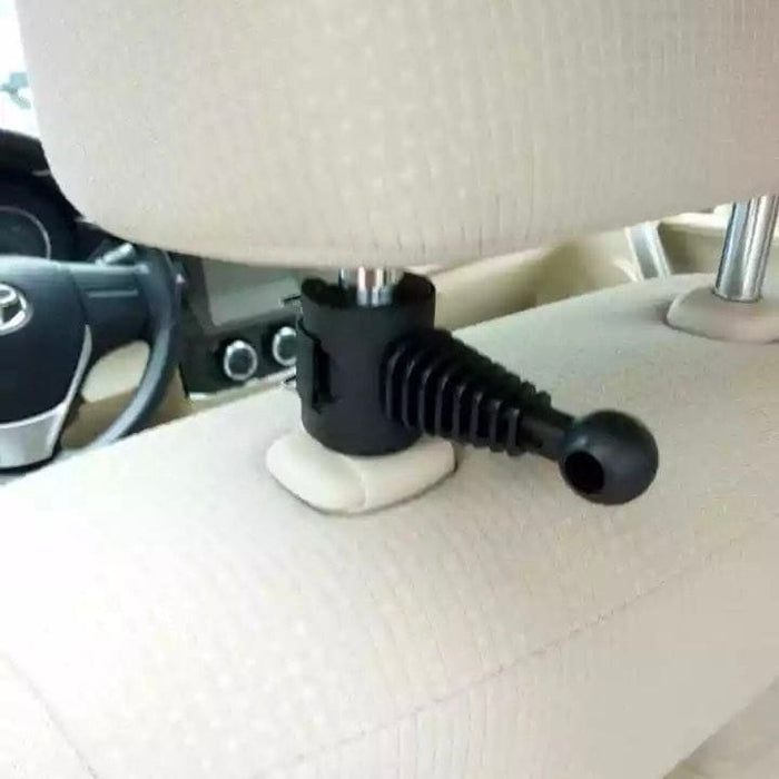 9eight5 phone headrest holder attached to car headrest, holding a smartphone for passenger entertainment and convenience.