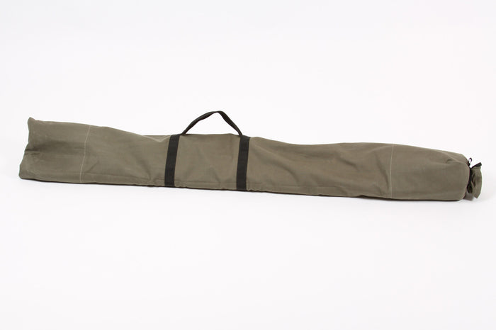 Olive green fabric roll-up bag with handle, perfect for storing and transporting gear.