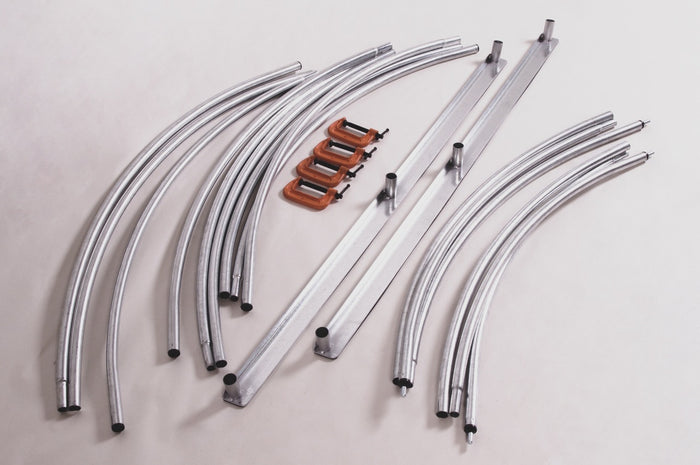 Set of metal tubing and clamps for construction, featuring curved aluminum pieces and sturdy C-clamps.