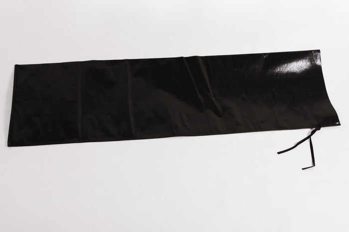 Black apron bag made of durable material, ideal for crafts and storage, features ties for secure closure.