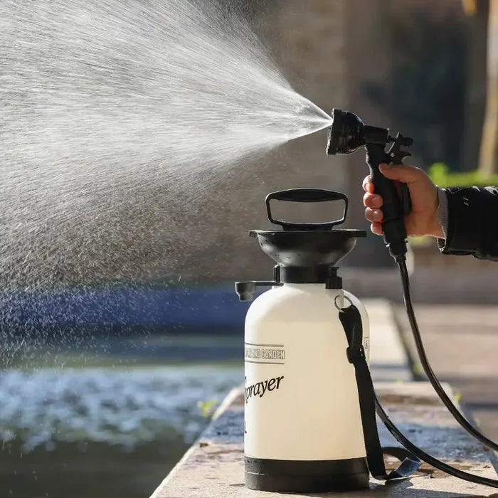Habicare portable outdoor manual camping shower with stainless steel body, 3/5/8L capacity, and hose for camping or outdoor use.