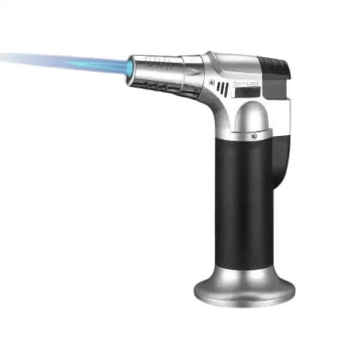Habicare stainless steel refillable butane gas lighter with adjustable flame, compact and sleek for convenient use.