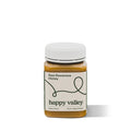 Jar of Rewarewa native honey from Happy Valley Honey, showcasing rich, golden raw honey with Rewarewa flower nectar.